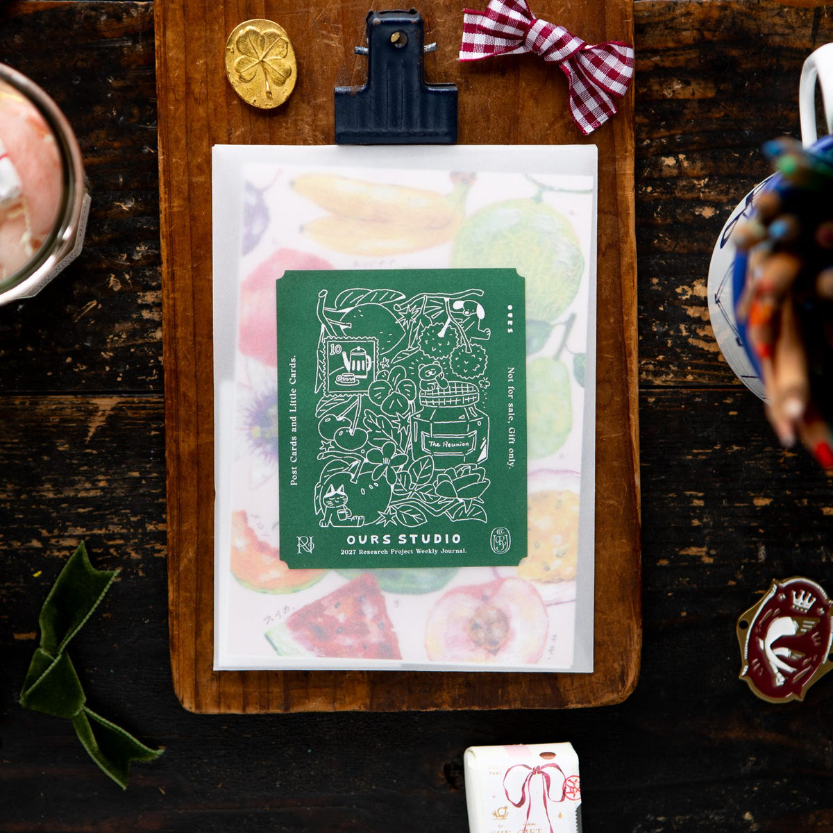 The postcards and little cards gift envelope that comes with the 2027 journal. Photo: OURS Studio