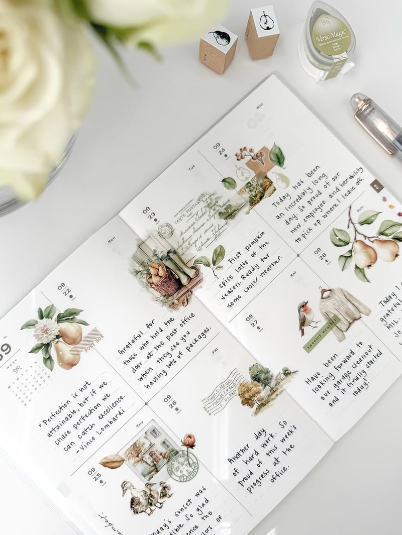 A September planner spread decorated with autumnal stickers