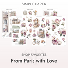 Collection of decorative paper sheets with Paris-themed designs on a white background.