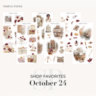 Sheet of decorative stickers with October designs on a white background, featuring books, florals, and vintage details