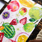 The fruit postcard from the 2027 set up close. Photo: OURS Studio