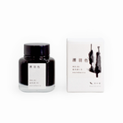 Tag Stationery Kyo No Oto Ink No. 1 Black Color Nurebairo, bottle with its box on a white background